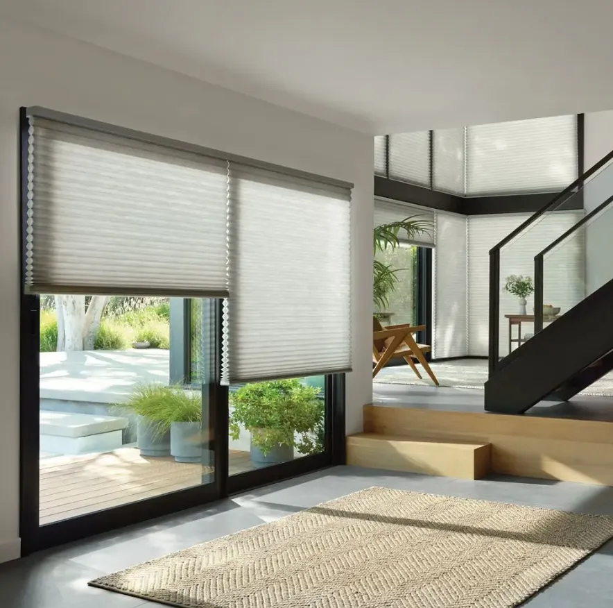 Custom cellular shades installed on large modern windows in a Sacramento area home, providing light control, privacy, and energy efficiency.
